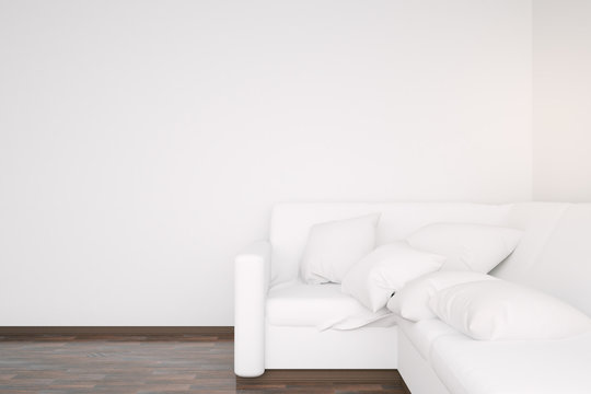 White sofa and blank wall