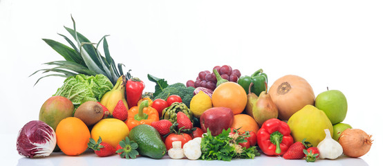Variety of fruits and vegetables on white background