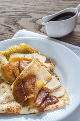 Crepes with brie and caramelized slices of apple