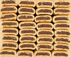 Fig cookies stacked in four rows