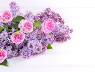Roses and lilac flowers