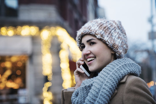 Close-up Of Happy Woman Talking On Mobile Phone