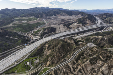 Aerial view of the Golden State 5 Freeway, Los Angeles Aqueduct and Sunshine Canyon Landfill in the Newhall Pass near Santa Clarita, California.