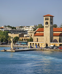 Fototapeta na wymiar View of Mandraki harbour in Rhodes city. Rhodes island. Greece