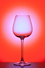 Naklejka na ściany i meble wineglass on colorful background