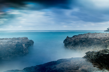 Playa Blanca, Rafael Freyre, Holguin, Cuba. Long exposure ocean front dawn.