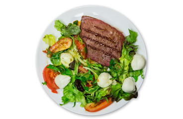 Beef steak with green salad