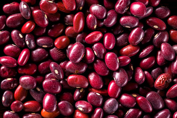 Closeup image of red haricot beans background.