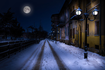 Winter night scene by the river of Florina, Greece, with snow
