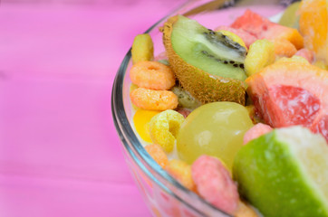 cereal with fruit in bowl on table