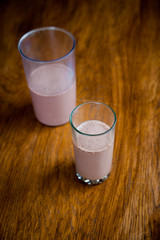 Smoothie and biscuits on a wooden table