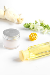 natural organic cosmetics with herbs for baby on white background