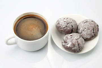 white Cup of black coffee with biscuits on white background.