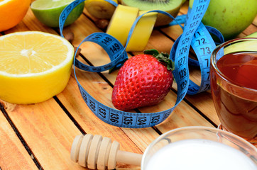 centimeter with fruit on table