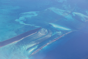 View from the plane to the city of Cancun, Mexico. Beautiful Ocean, the Caribbean Sea. View from above, top view