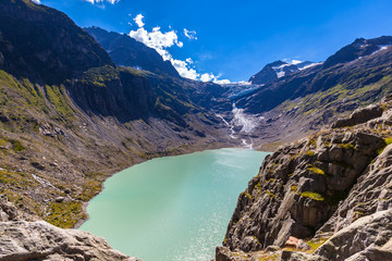 Panorama view of Trift lake and glacier