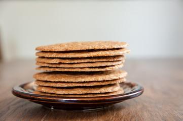 Smoothie and biscuits on a wooden table