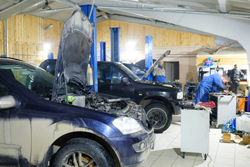 Cars in car repair station