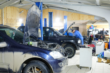 Cars in car repair station