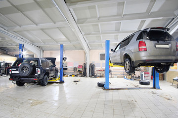 Cars in car repair station