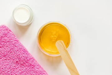 concept depilation with wax on white background top view