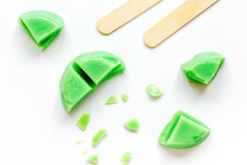 concept depilation with wax on white background top view