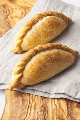 Kibinai (kybyn,kybynlar,chiburekki,pelmeni,shishlik) are traditional pastries filled with mutton and onion, popular with Karaite ethnic minority in Lithuania