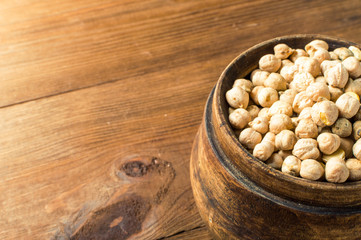 Portion of Chick Peas in wooden bowl