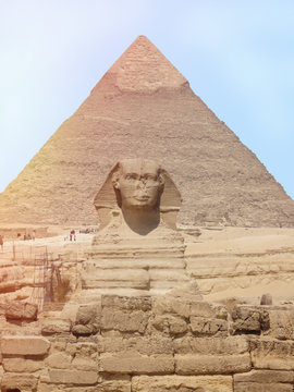 View of the Sphinx head with pyramid in Giza near Cairo, Egypt