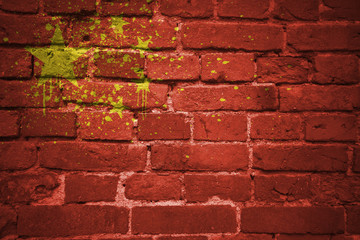 painted national flag of china on a brick wall