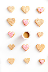 cookies for Valentine Day heartshaped white background top view pattern