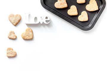 cookies for Valentine Day heartshaped on white background top view