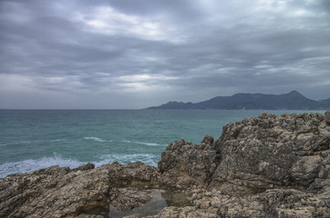 Fototapeta na wymiar Panorama of sea shore. Extreme fishing. Greece