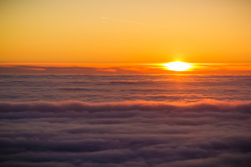 Fototapeta na wymiar Beautiful sunset and clouds. In air