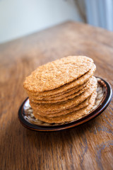 Smoothie and biscuits on a wooden table