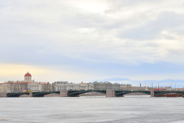 View of Exchange Bridge, Vasilevsky Island and frozen Neva River.