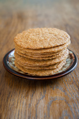 Smoothie and biscuits on a wooden table