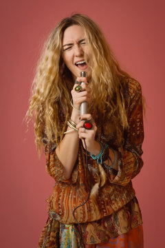 Rock star singing into a microphone