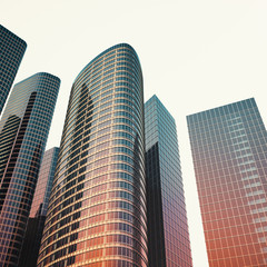 Bottom view of modern skyscrapers in business district in evening light at sunset. Industrial architecture, business construction and estate financial concept. 3d rendering