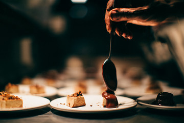 Chef's Chocolate Covered Hand Spoons Melted Ewe's Milk Chocolate On To A Marshmallow