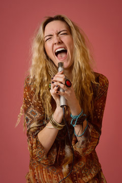 Rock star singing into a microphone