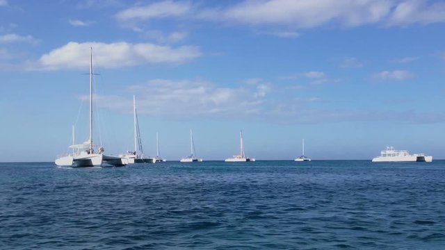 Luxury yachts in a sea at sunny day