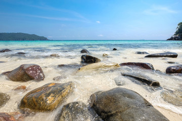 Landscape of sea sun rock sand beach under blue sky. Summer holi