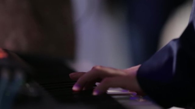 playing the piano at the concert