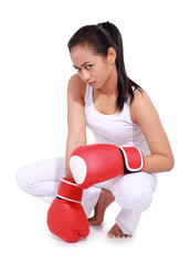 beautiful woman with the red boxing gloves, isolated on white background