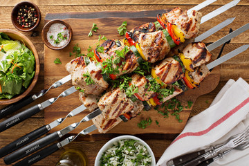 Pork and vegetables cabobs on the cutting board