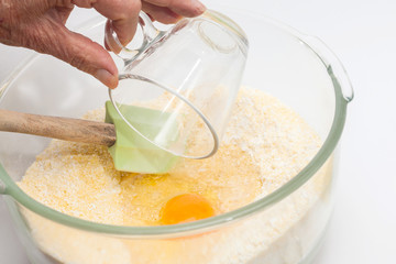 Pandebono preparation : Adding warm water for pandebono dough