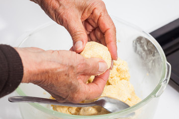 Pandebono preparation :  Form pandebono dough into medium sized balls