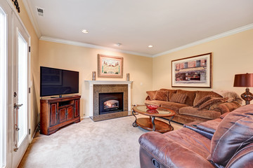 Family room interior in brown and beige tones