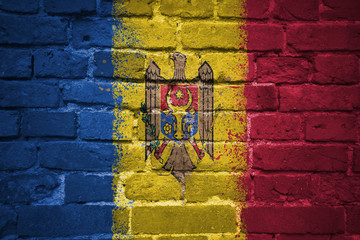 painted national flag of moldova on a brick wall